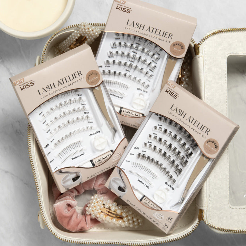 Kiss Lash Atelier lash extension design kit with accessories on a marble surface