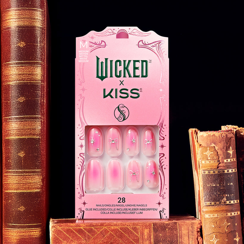 Wicked x Kiss nail set with pink ombre nails and decorative star bow designs, 28 count.
