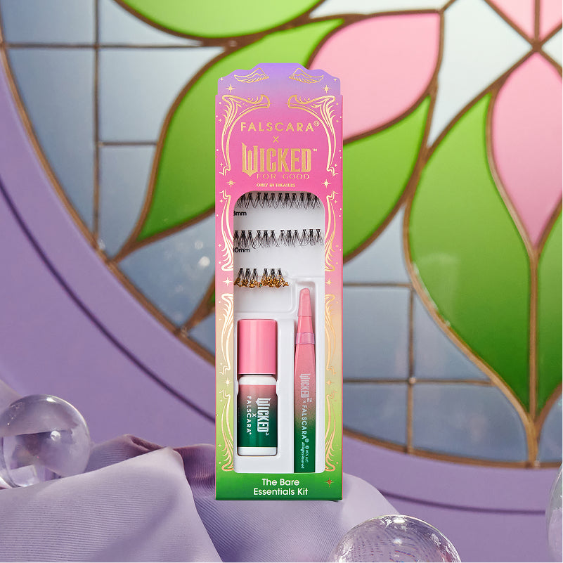 Falscara Wicked Lashes kit with false eyelashes, lash glue, and applicator on colorful background.