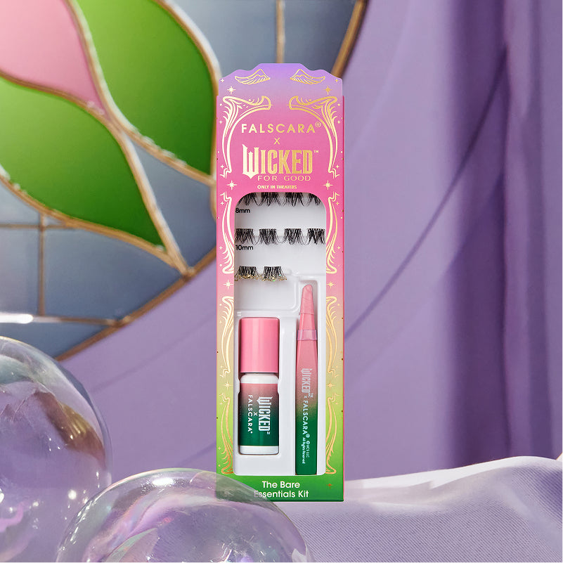 Falscara Wicked For Good lash kit with pink and green packaging on colorful background.