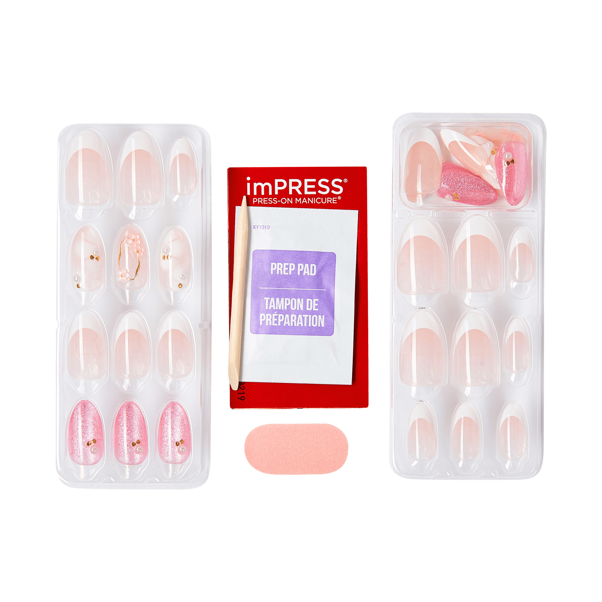Nail extension kit with press-on nails, prep pad, and nail form on a green background