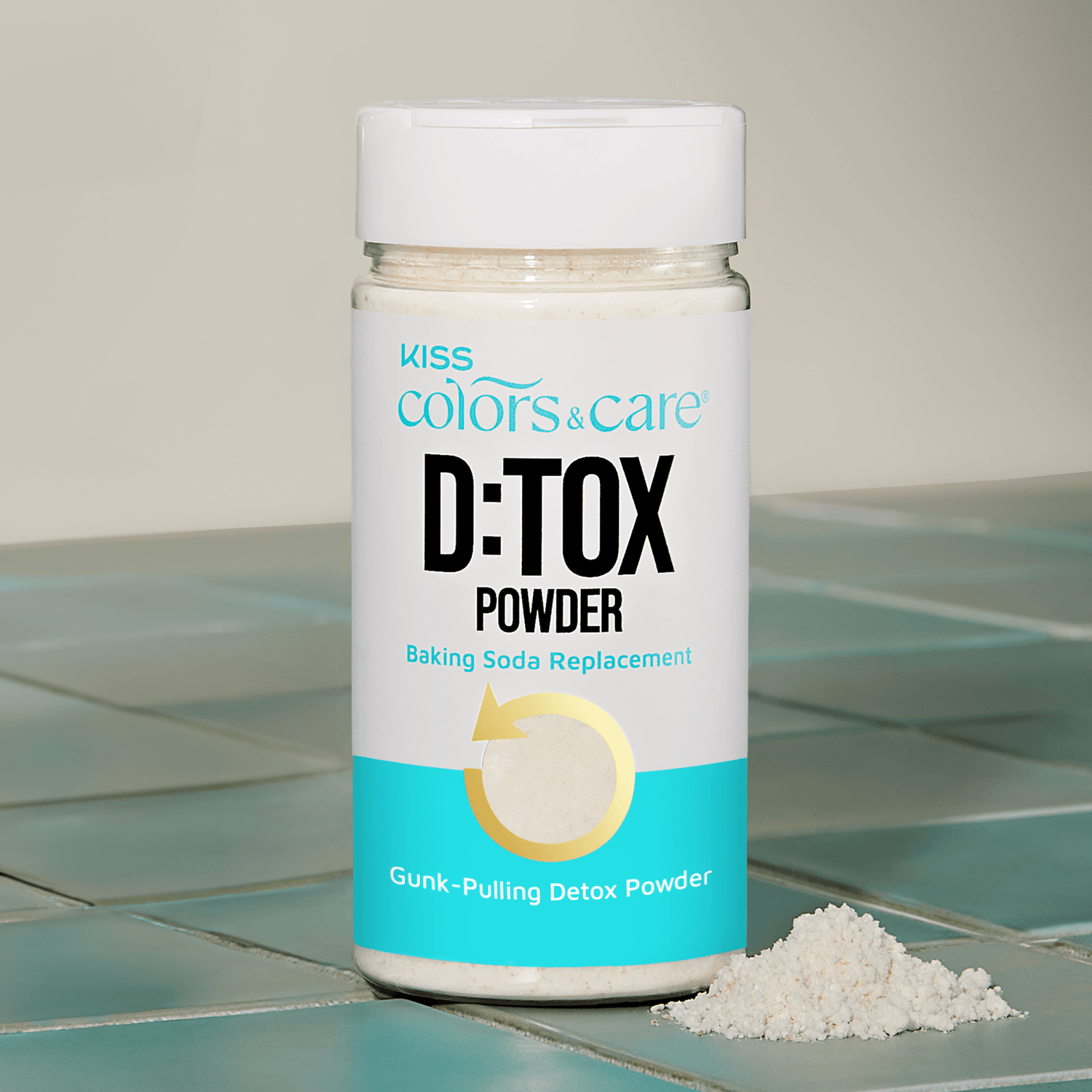 Bottle of D:TOX Powder on a tiled surface with a neutral background