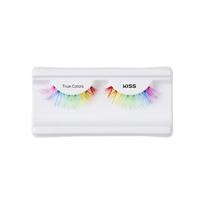 The image shows a pair of false eyelashes in a white plastic case. The eyelashes are multicolored, featuring a gradient of vibrant hues including red, orange, yellow, green, blue, and purple. The packaging has the words "True Colors" on the left side and "KISS" on the right side. The overall presentation is clean and visually appealing, highlighting the colorful and playful nature of the eyelashes.