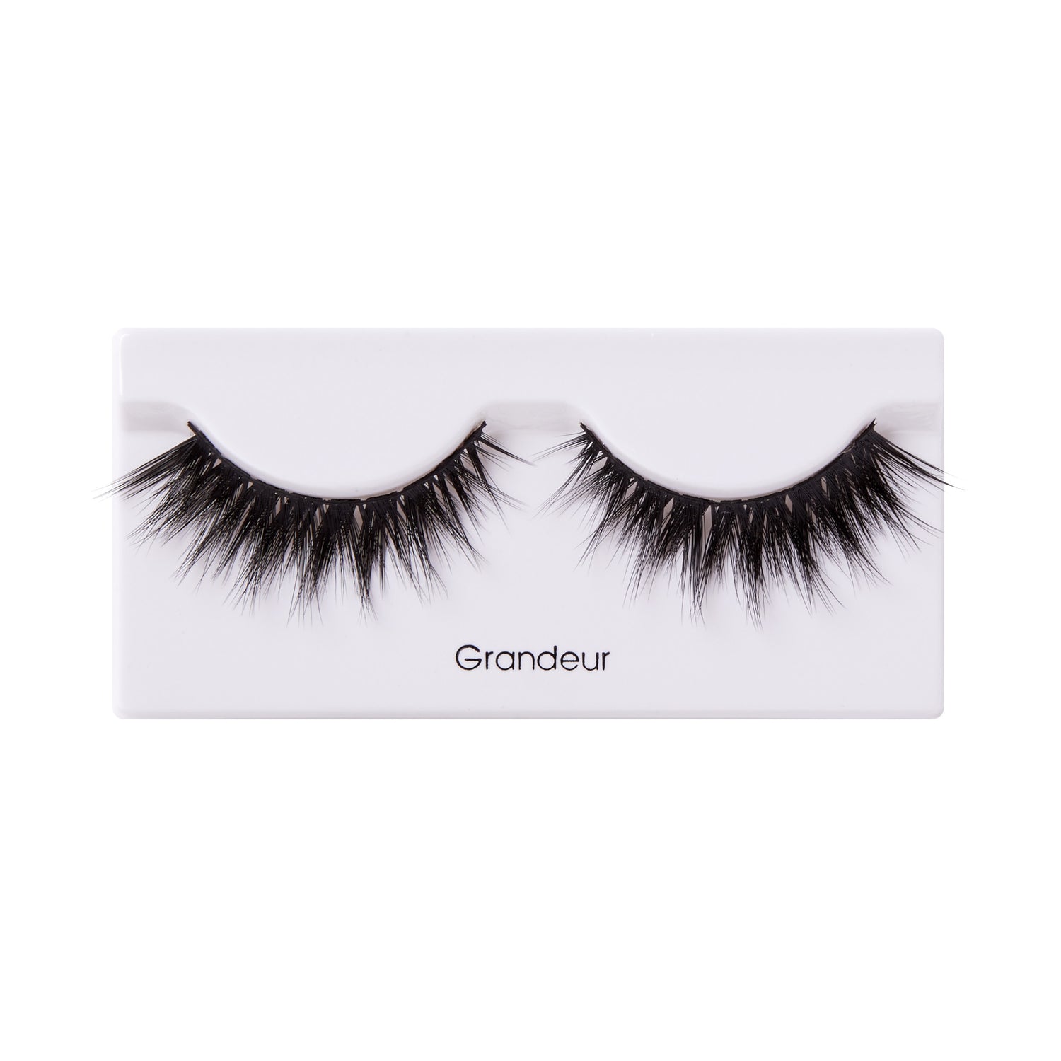 Grandeur black false eyelashes on white packaging with brand name