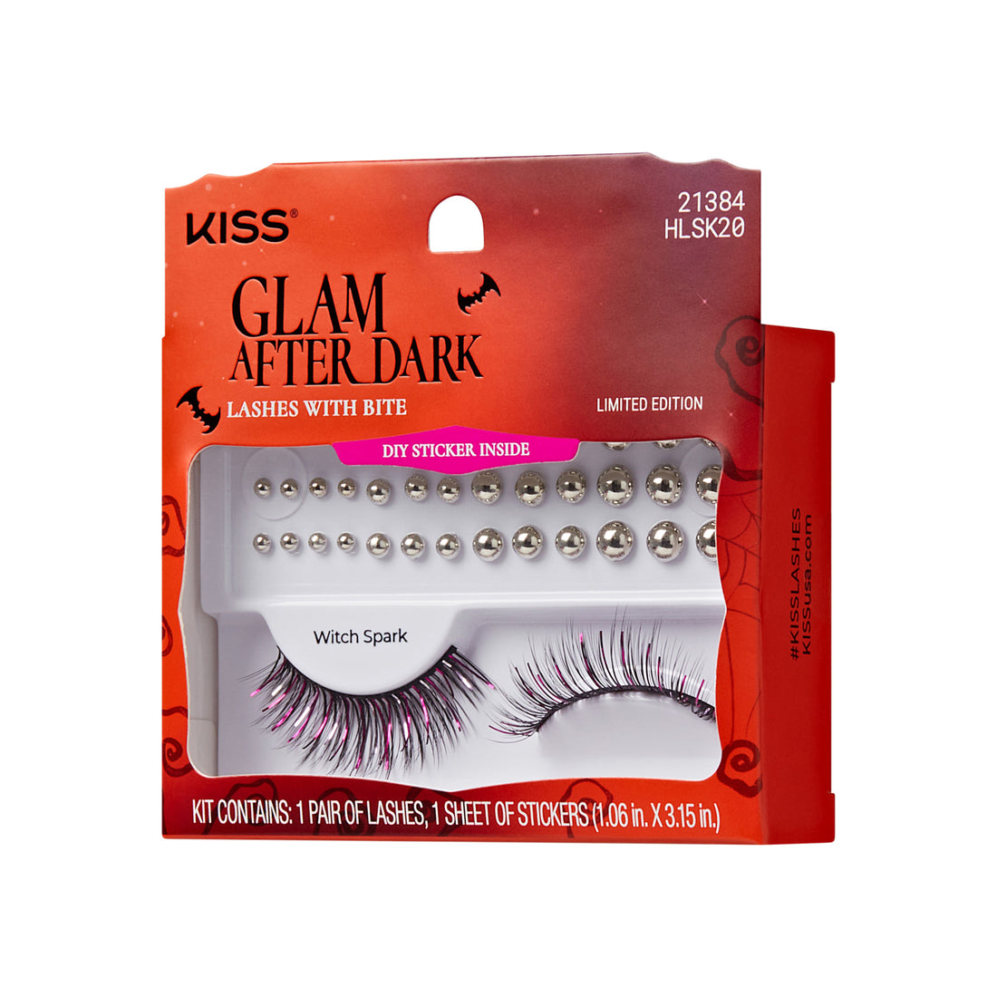 The image features a packaging for "KISS Glam After Dark" false eyelashes, specifically designed for a Halloween theme. The box is adorned with a spooky aesthetic, including bats and a dark color scheme. Inside, it contains one pair of dramatic lashes called "Witch Spark," which have a mix of black and purple colors. Additionally, there is a sheet of stickers included, enhancing the festive look. The packaging is labeled as a limited edition, emphasizing its seasonal appeal.