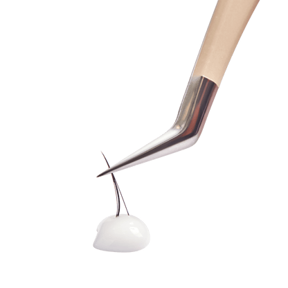 Precision tweezers holding two hairs over white gel or adhesive droplet