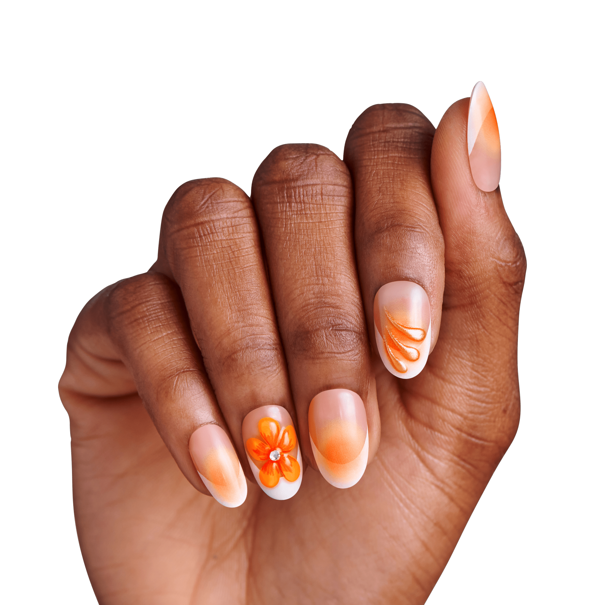 Hand with oval-shaped press-on nails featuring orange and white ombre design with orange floral nail art and swirl accents on a transparent background