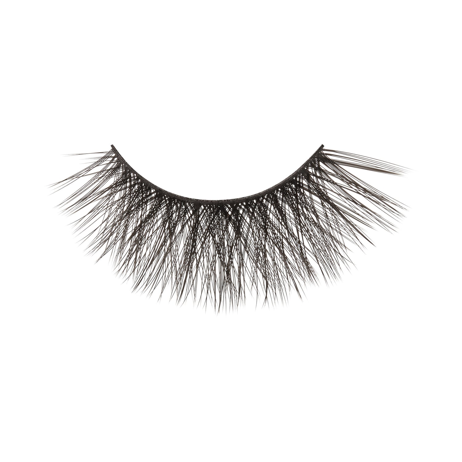 Black false eyelashes with dramatic volume and length against white background.