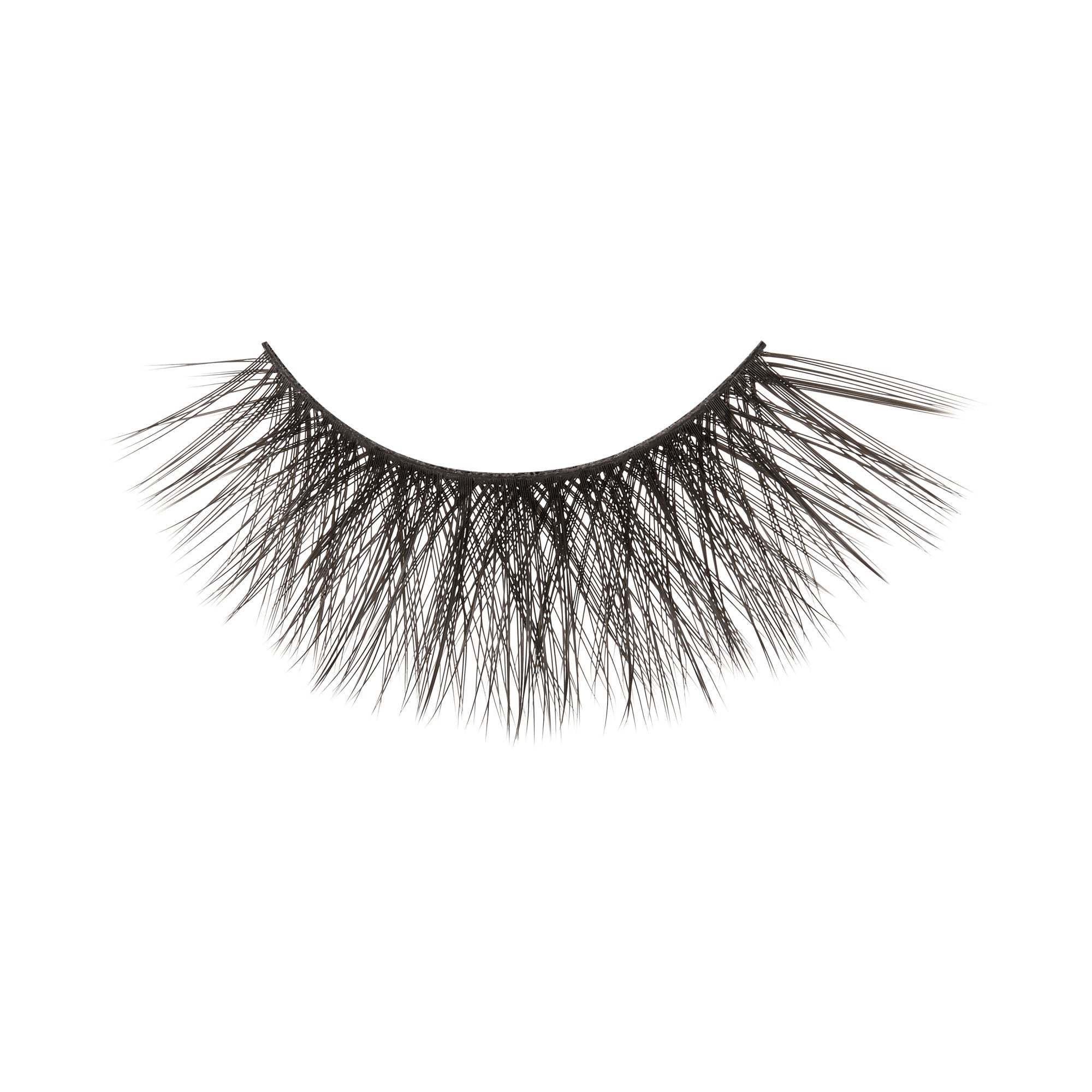 Black false eyelashes with dramatic volume and length against white background.