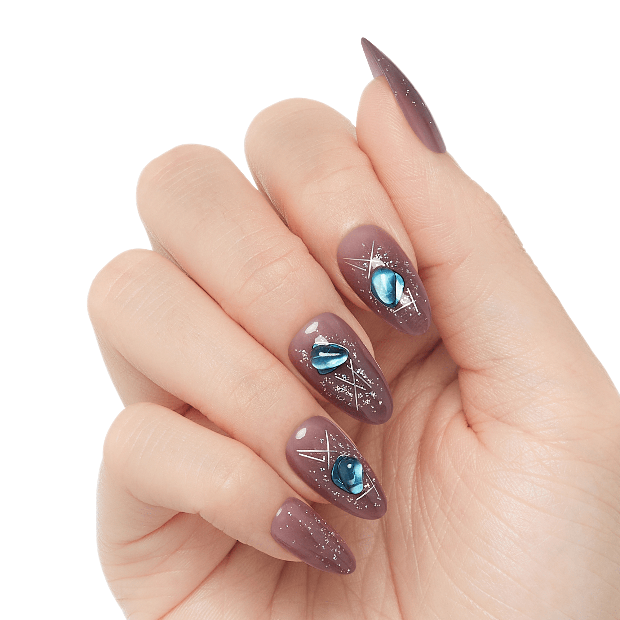 Fingernails with almond-shaped, mauve-colored press-on nails decorated with silver geometric lines and blue gem-like accents.