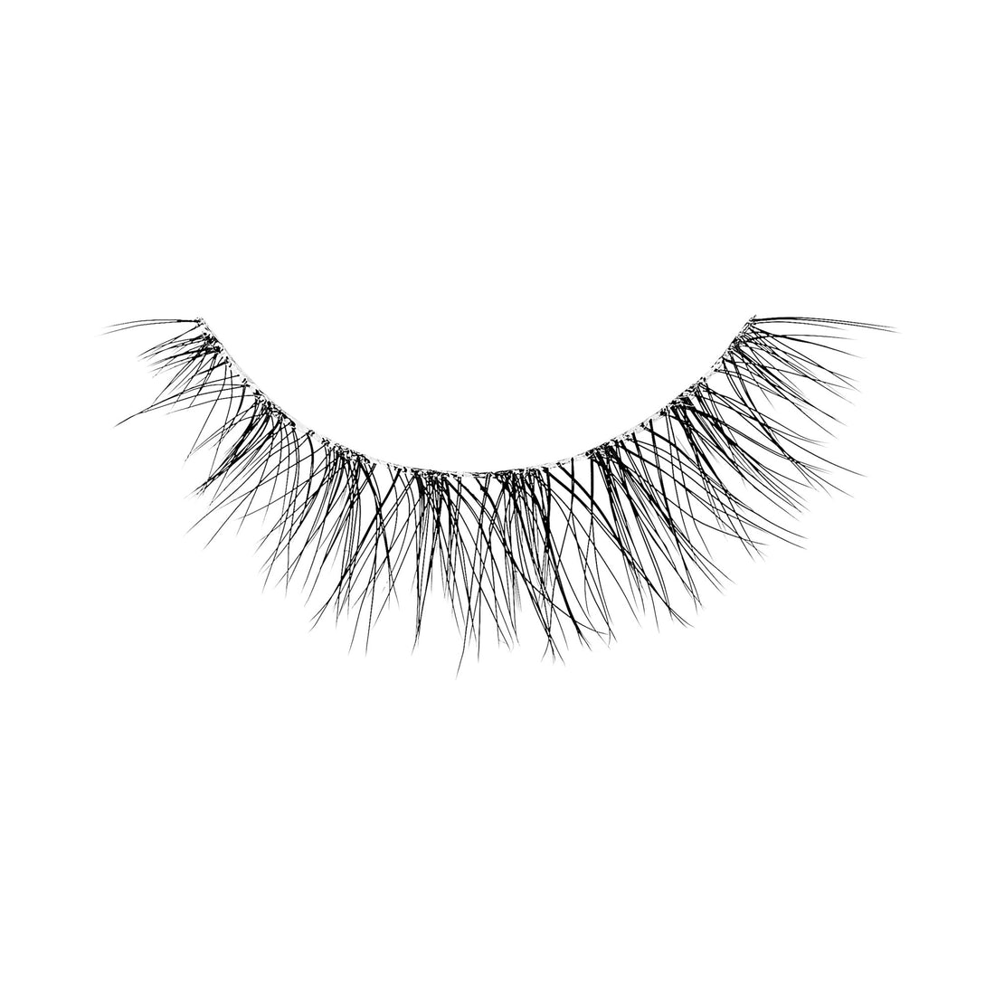 A single strip of lashes in a natural lash pattern. Lashes are from KISS The New Natural collection multipack in &