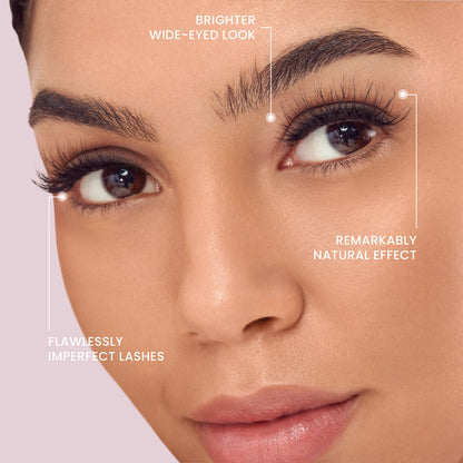 Close-up of a person wearing KISS lashes in &