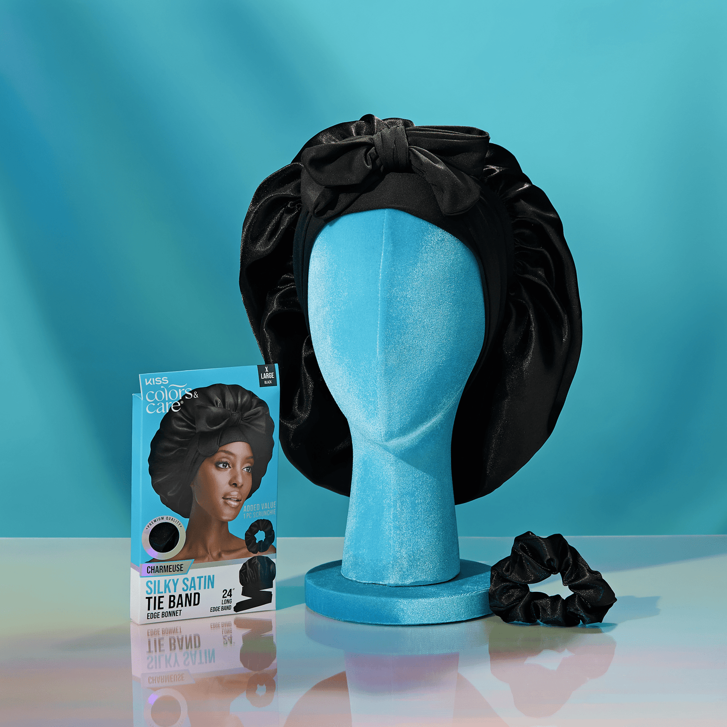 Kiss Colors &amp; Care Silky Satin Tie Band displayed on blue mannequin head with product box.