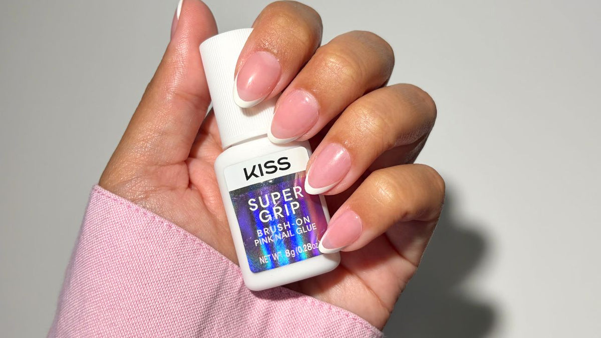 Kiss SuperGrip Brush-On Pink Nail Glue | Nail Adhesive, Press-On Glue, Vitamin E Infused, Long-Lasting Wear, Clean &amp; Strong, Pink Tint, 0.28 oz.