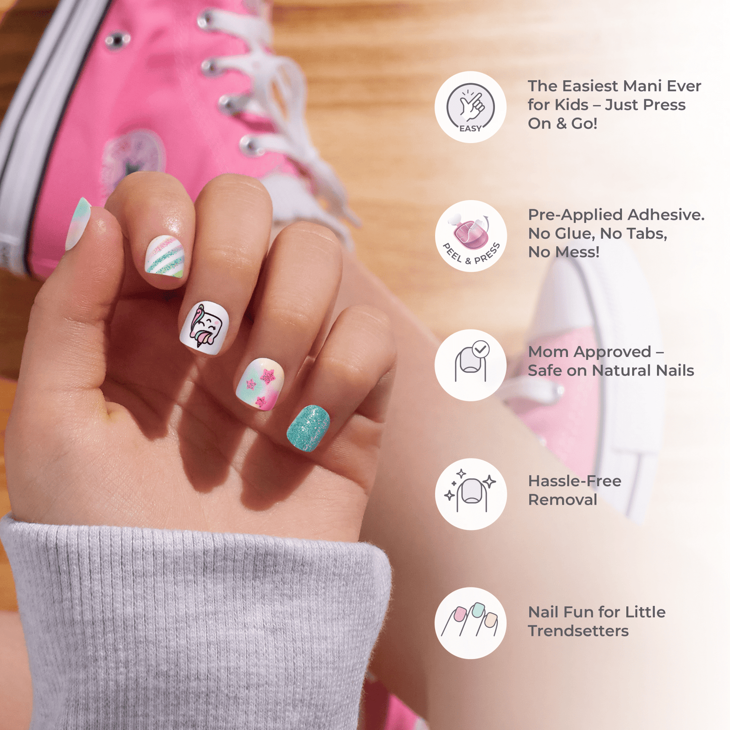 Hand with colorful nail art in front of a pink shoe, with product features listed on the right.