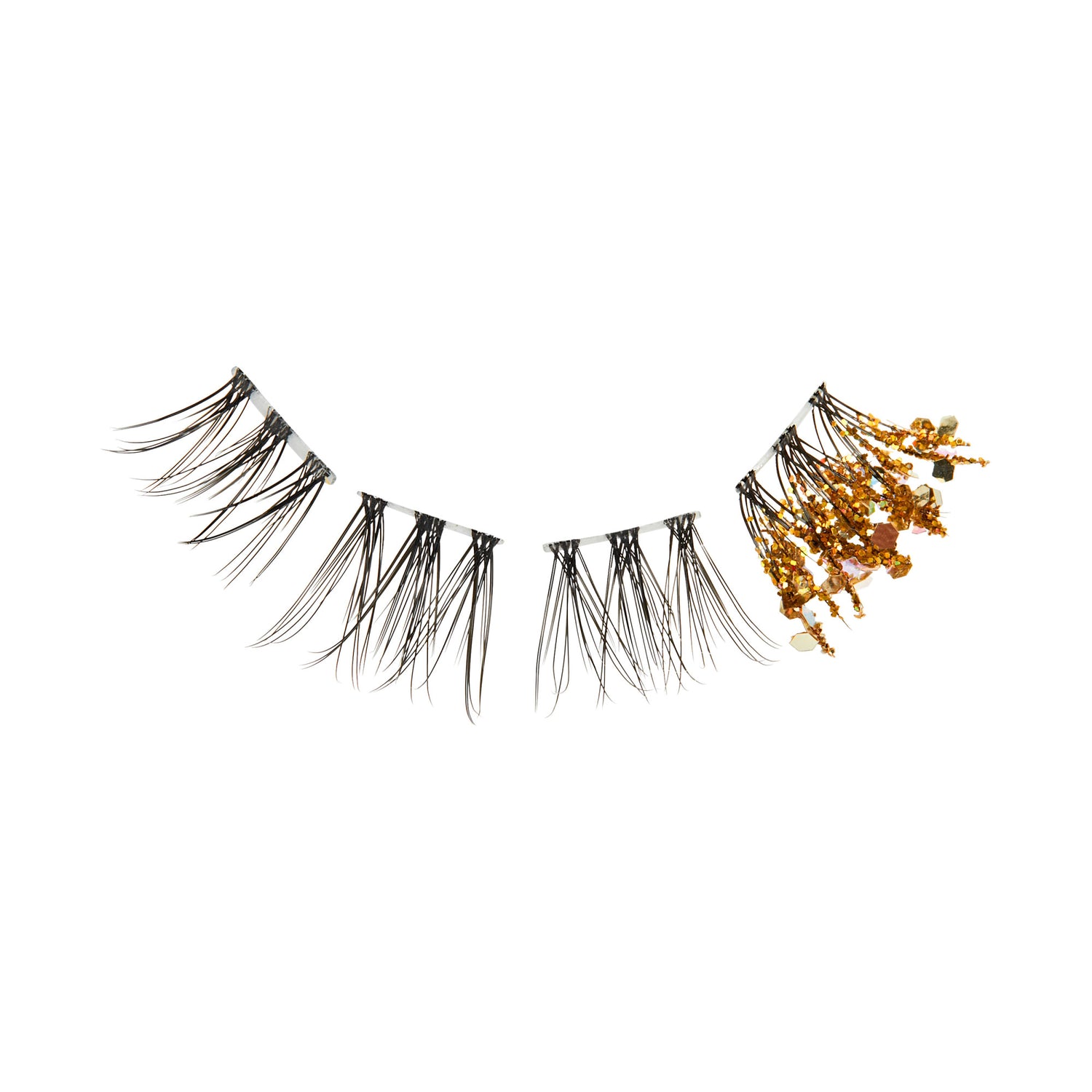 Delicate false eyelashes with wispy black fibers and gold glitter embellishments on the outer edge, shown against a white background.